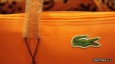 how to spot a fake lacoste bag|lacoste bag stitching check.